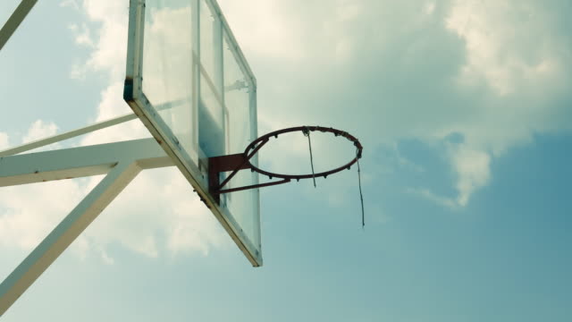 Outdoor-Basketball-cage-stand-beautiful-clouds-moving