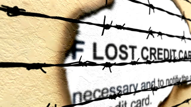 Lost-credit-card-against-barbwire