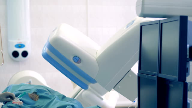 Hospital-equipment-works,-while-a-doctor-performs-a-surgery.-4K.
