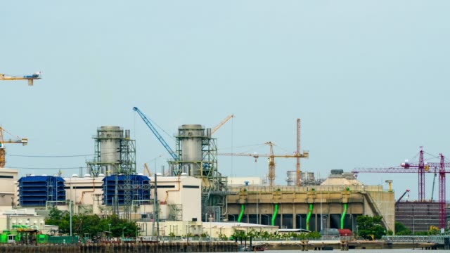 4K:Time-lapse:-Crane-building-site.-Power-Plant-Construction.-Dolly-shot