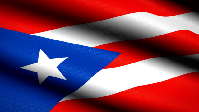 Puerto-Rico-Fahnenschwingen-Textile-strukturierten-Hintergrund.-Seamless-Loop-Animation.-Vollbild.-Slow-Motion.-4K-Video