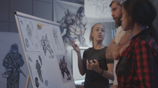 Female-designers-discussing-video-game-art