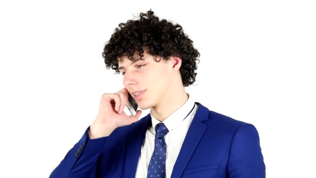 young-Businessman-Talking-on-Smartphone