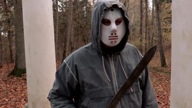 Hombre-en-scary-Halloween-Máscara-y-machete