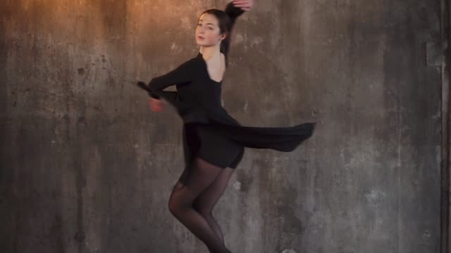 young-woman-dances-in-the-studio-dance-in-the-style-of-modern-jazz-she-rehearses