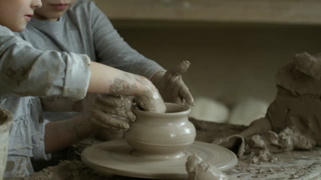 Children-Making-Pottery-in-Class