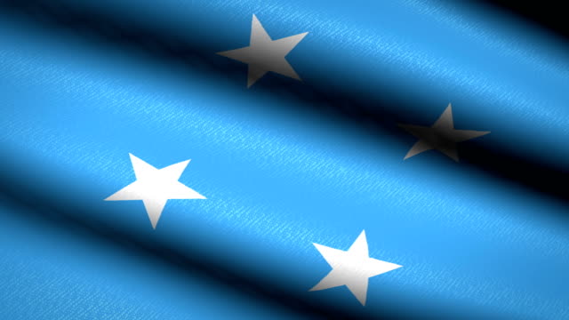 Micronesia-bandera-ondeando-textil-textura-de-fondo.-Seamless-Loop-animación.-Pantalla-completa.-Cámara-lenta.-Vídeo-de-4-K
