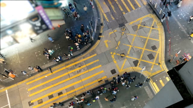 Top-view-of-people-crossing-the-road.