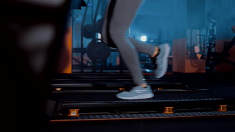 Running-on-the-track.-Legs-in-sneakers.-Close-up
