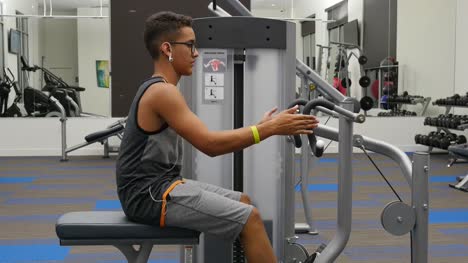 Young-Latin-Teenager-Casually-Working-Out