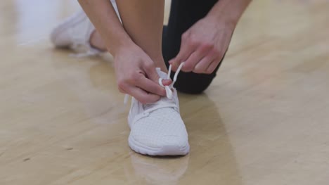 Closeup-shot-of-shoe-being-tied-at-gym