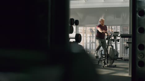 Fit-Elderly-Man-on-Cycling-Machine