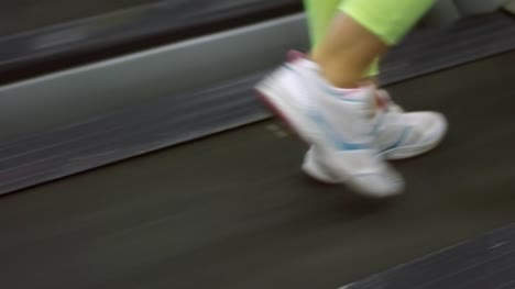 Legs-of-Woman-on-Treadmill