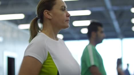 Woman-Running-on-Treadmill-in-Gym