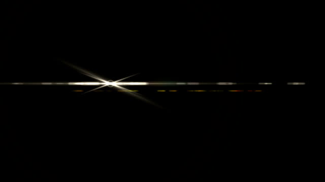 Abstrakte-Blendenfleck-Licht-über-schwarze-background.sun-auf-schwarzem-Hintergrund-Bewegung-platzen.-Offenen-Lichtszene
