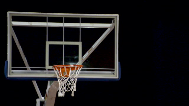 People-training-basketball-shooting.-Backboard-close-up.-Flat-plane.-Side-view