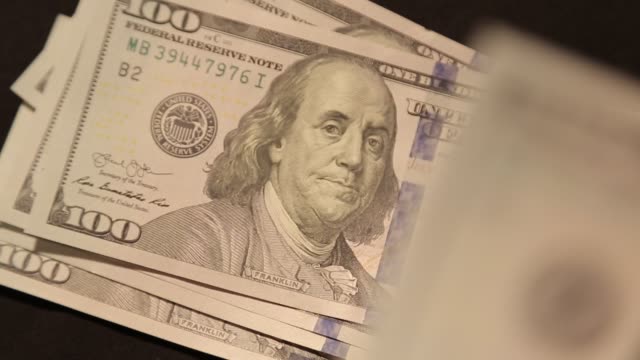 Hundred-dollar-bills-consider