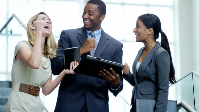 Male-female-multi-ethnic-business-team-in-office