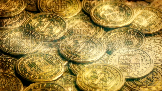 Magisch-glitzernden-Gold-Münzen