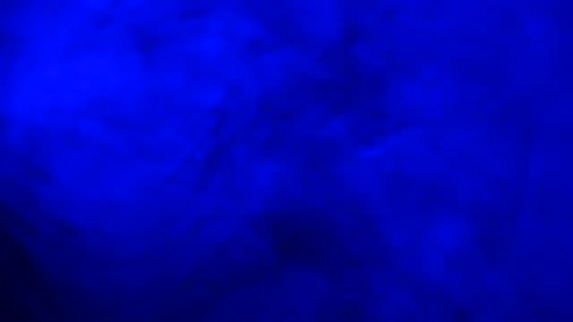 Abstract-Form-Blue-Smoke-Like-Cloud-Wave-Effect-On-Black-Background,-Flowing