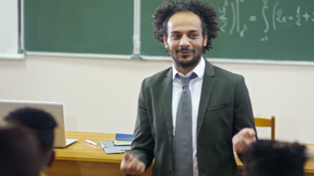 Smiling-University-Professor-Delivering-Lecture