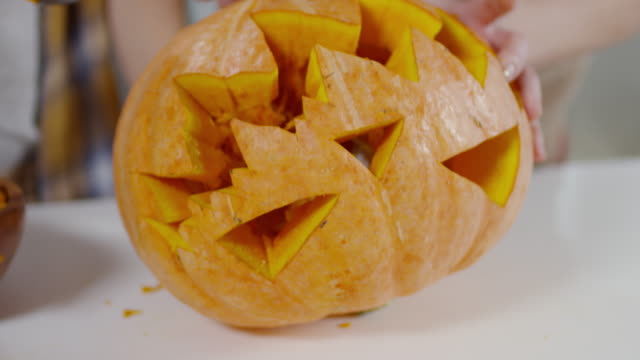 Removing-Filling-from-Carved-Pumpkin
