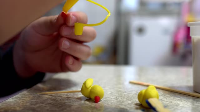 A-child-playing-with-clay.