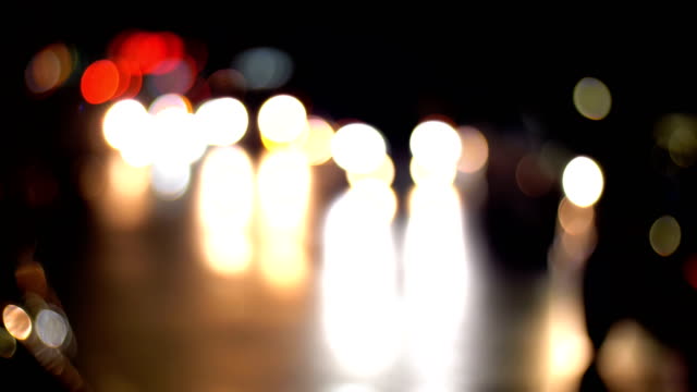 Ciudad-de-noche-Defocused-semáforos