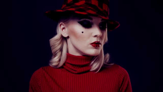 Woman-in-red-hat-with-red-lips.
