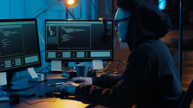 hacker-using-computer-for-cyber-attack-at-night
