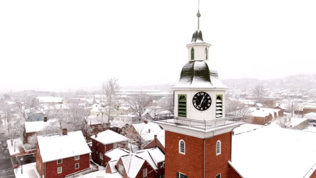 Aerial-Winter-Establishing-Shot-Old-Economy-Village-Church