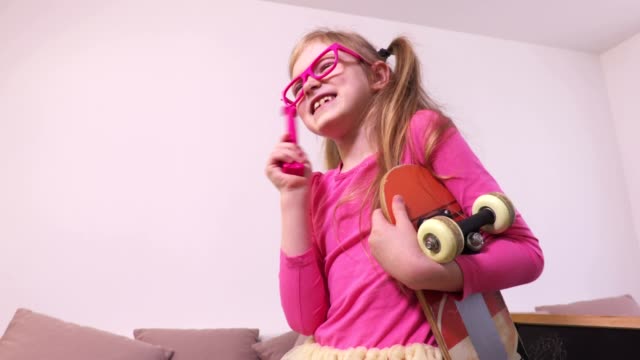 Funny-girl-with-magic-wand-and-skateboard