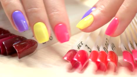 Nail-samples-and-multicolored-manicure.