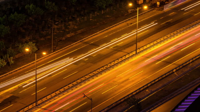 Overview-time-lapse-shot-of-night-road-traffic