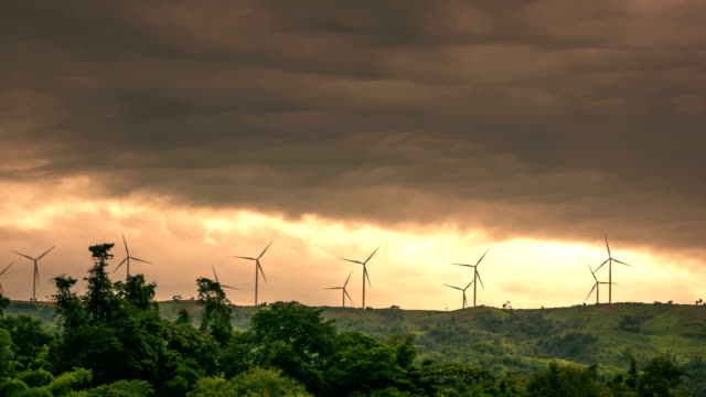 4k-time-lapse,Scenery-in-the-evening-before-the-rainstorm-will-come-of-Wind-turbines-for-electricity-in-the-mountains,-Khao-Kho,-Phetchabun,-Thailand.