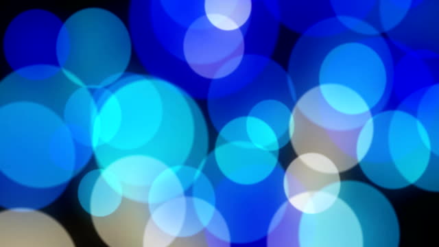 abstract-background-with-animated-glowingblue,-cyan,-white-bokeh-loop,-alpha