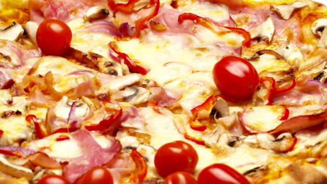 Rustic-italian-pizza-with-ham,-kaiser,-mozzarella-and-mushrooms