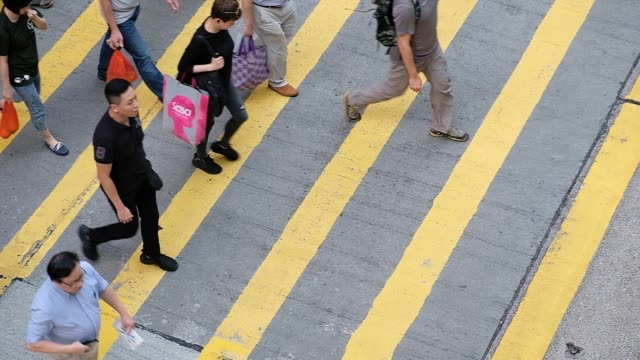 Slow-Motion-von-beschäftigt-Fußgängerüberweg-in-Hong-Kong