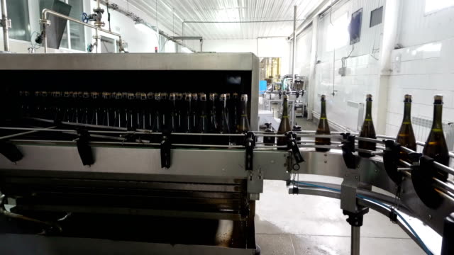 Washing-line-for-bottles-and-bottling-of-champagne-conveyor-at-the-factory
