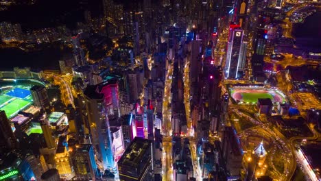 Districto-de-chai-wan-iluminada-noche-aérea-timelapse-panorama-4k-hong-kong