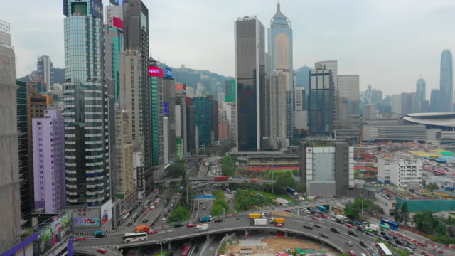 día-tiempo-ciudad-centro-carretera-nudo-aéreo-panorama-4k-hong-kong