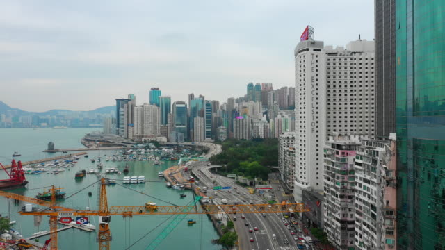 día-tiempo-paisaje-urbano-tráfico-centro-victoria-Bahía-Puerto-aéreo-panorama-4k-hong-kong