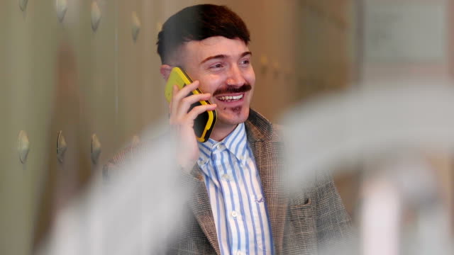 Businessman-Using-Phone