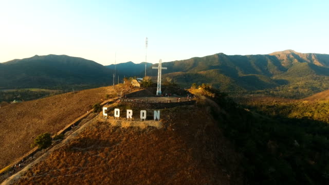 Sign-of-the-city-of-Coron-on-the-hill.Cross-on-a-hill,-Coron,-Philippines,Palawan-Busuanga