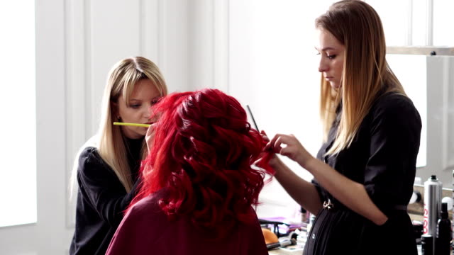 make-up-artist-and-hairdresser-serve-the-client