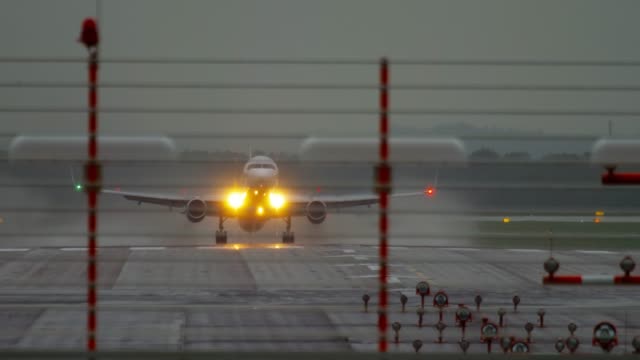 Airplane-departure-at-rainy-weather