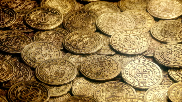 Glänzende-Gold-Münzen-drehen