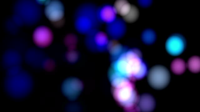 abstract-background-with-animated-glowing-purple-magenta-green-red-bokeh