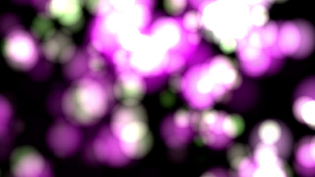Fondo-abstracto-con-animación-que-brilla-intensamente-púrpura-magenta-verde-blanco-bokeh