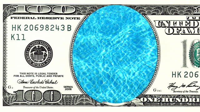 Blue-water-in-swimming-pool-in-frame-of-100-dollar